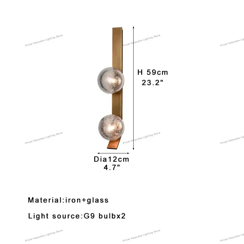 Modern bronze wall sconce lamps with brass finish and two frosted glass globe shades for bedroom use