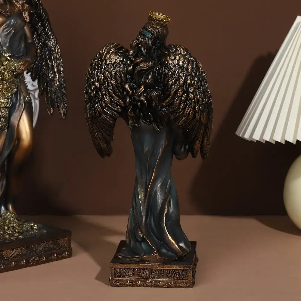 Bronze goddess fortune figurine with detailed feathered wings and crown on ornate base for office wealth decor