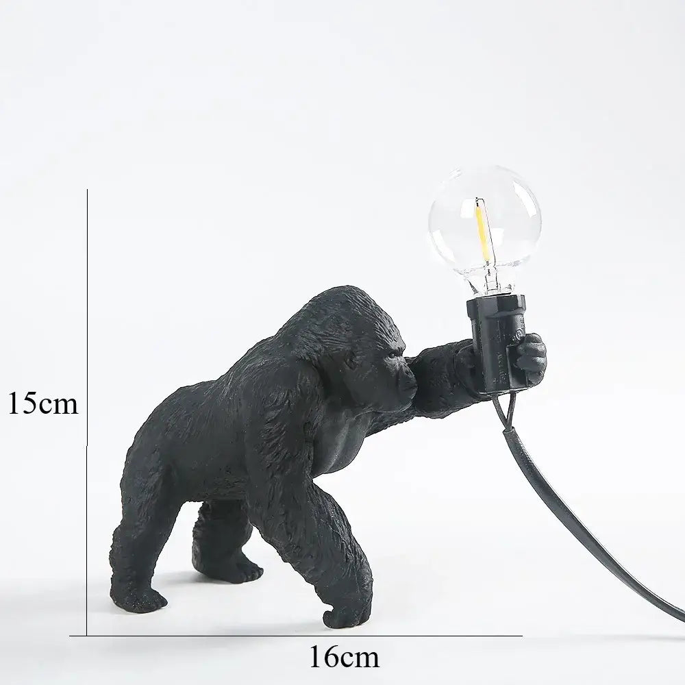 Bronze king kong gorilla table lamp with black matte textured finish holding exposed filament bulb for bedroom night light decorbites king kong