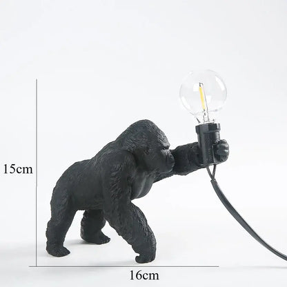 Bronze king kong gorilla table lamp with black matte textured finish holding exposed filament bulb for bedroom night light decorbites king kong