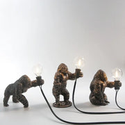 Bronze king kong gorilla table lamp with textured fur holding exposed bulbs perfect for bedroom night light decorbites king kong