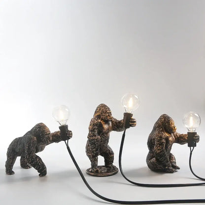 Bronze king kong gorilla table lamp with textured fur holding exposed bulbs perfect for bedroom night light decorbites king kong