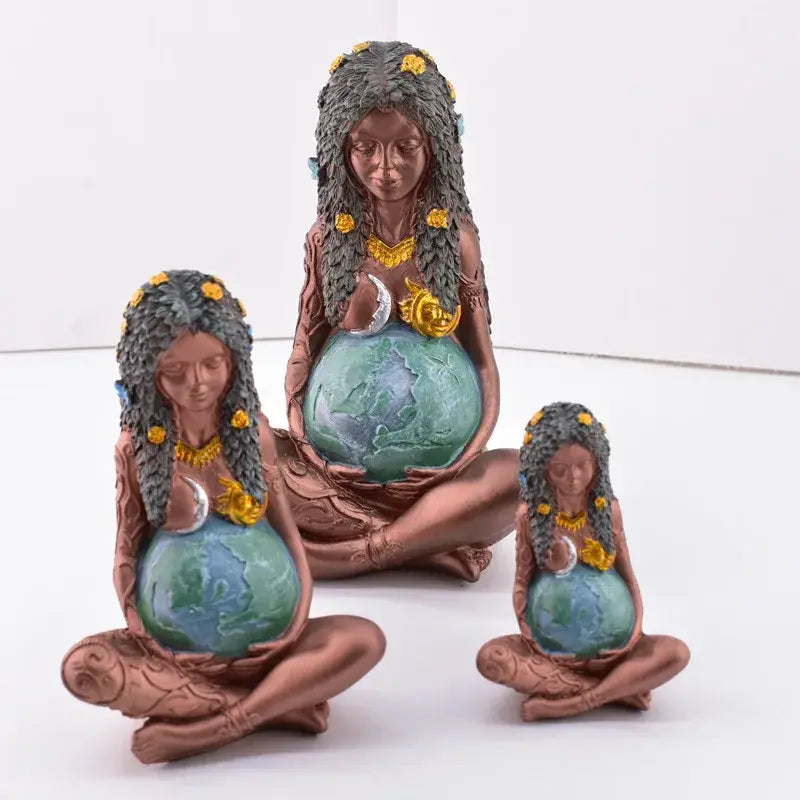 Bronze mother earth figurines set of 3 featuring seated women in yoga pose with gray hair and green globes decorbites gaia mother