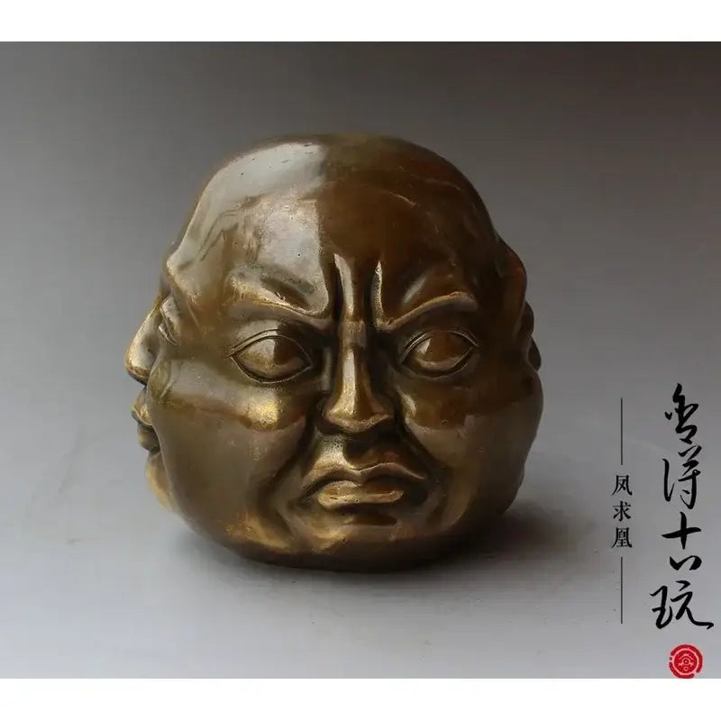 Bronze polished buddha head statue with intricate multi-faced carving for serene living room decor