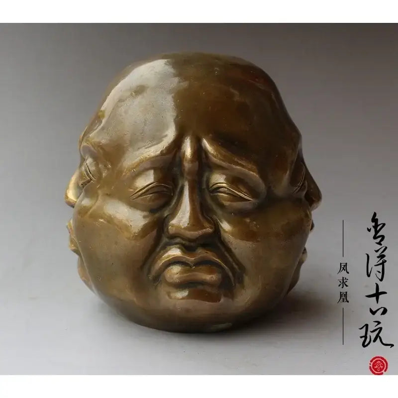 Bronze polished buddha head statue with three smiling faces intricately carved for serene living room decor