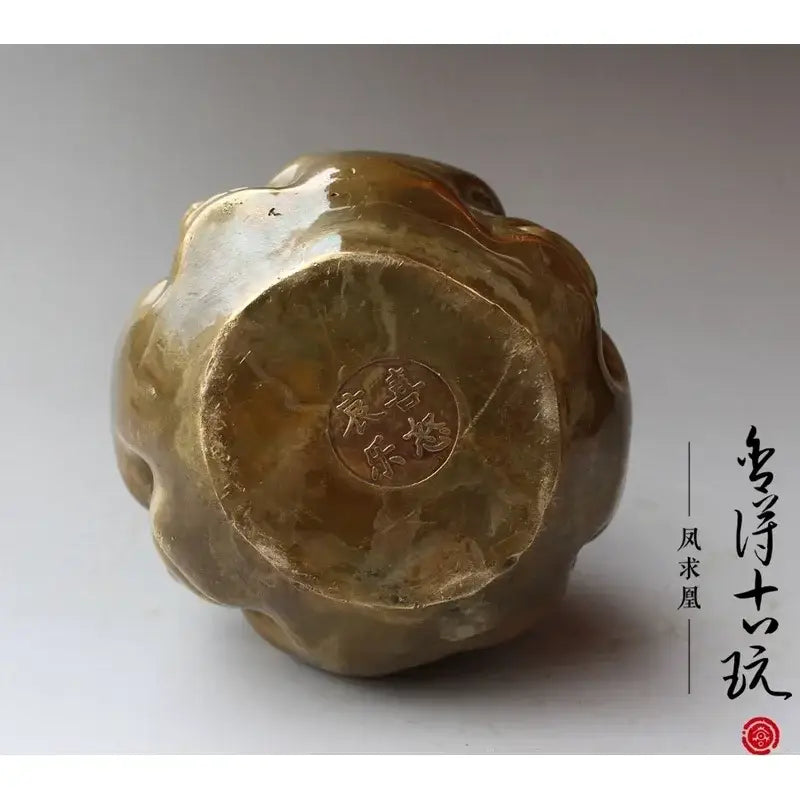 Glossy amber ceramic vase with scalloped base and engraved chinese characters on underside for buddha head statue decor