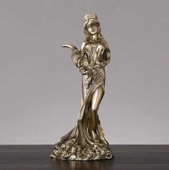 Bronze-colored greek wealth goddess figurine with crown and horn standing on coins for living room decor