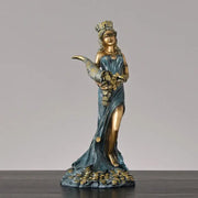 Bronze and teal greek wealth goddess fortuna figurine in flowing robes holding coins on a base with gold coins for decor