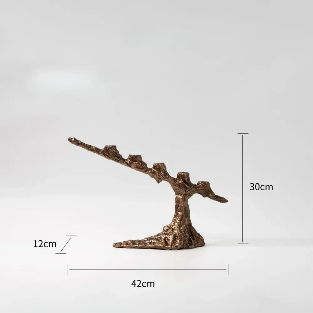 Bronze-colored intricately textured bamboo candle holder with gnarled trunk design for dining room decorbites candle decor