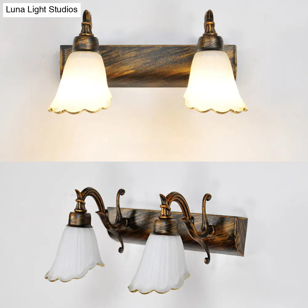 Bronze Wall Lamp with Country Flower Shade and White Rid Glass for Vanity Lighting