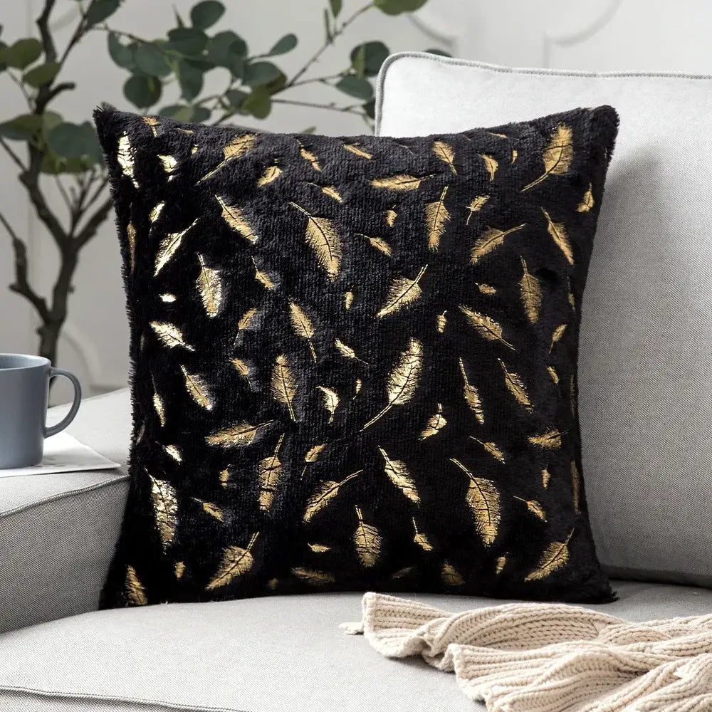 Black velvet throw pillow with bronzed feather style gold embroidery for emerald green velvet living room decor