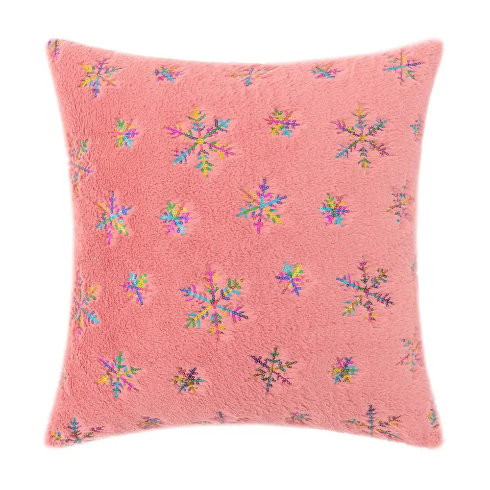 Pink fuzzy throw pillow with colorful sequined snowflake patterns featuring bronzed feather style decor accents