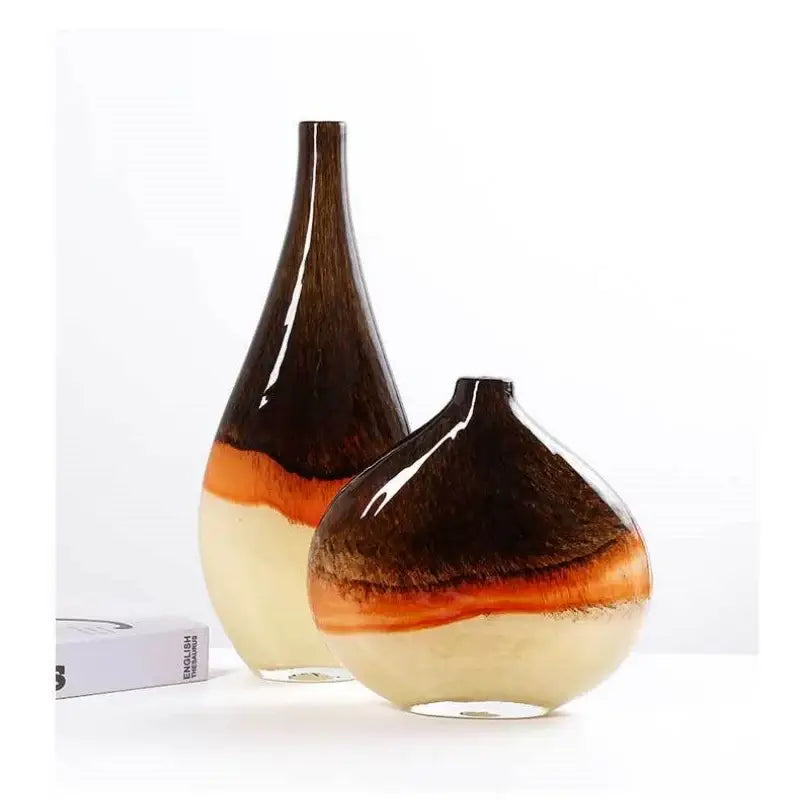 Two glossy brown and cream gradient glass vases with smooth curves for home decor and decorbites gradient glass collection