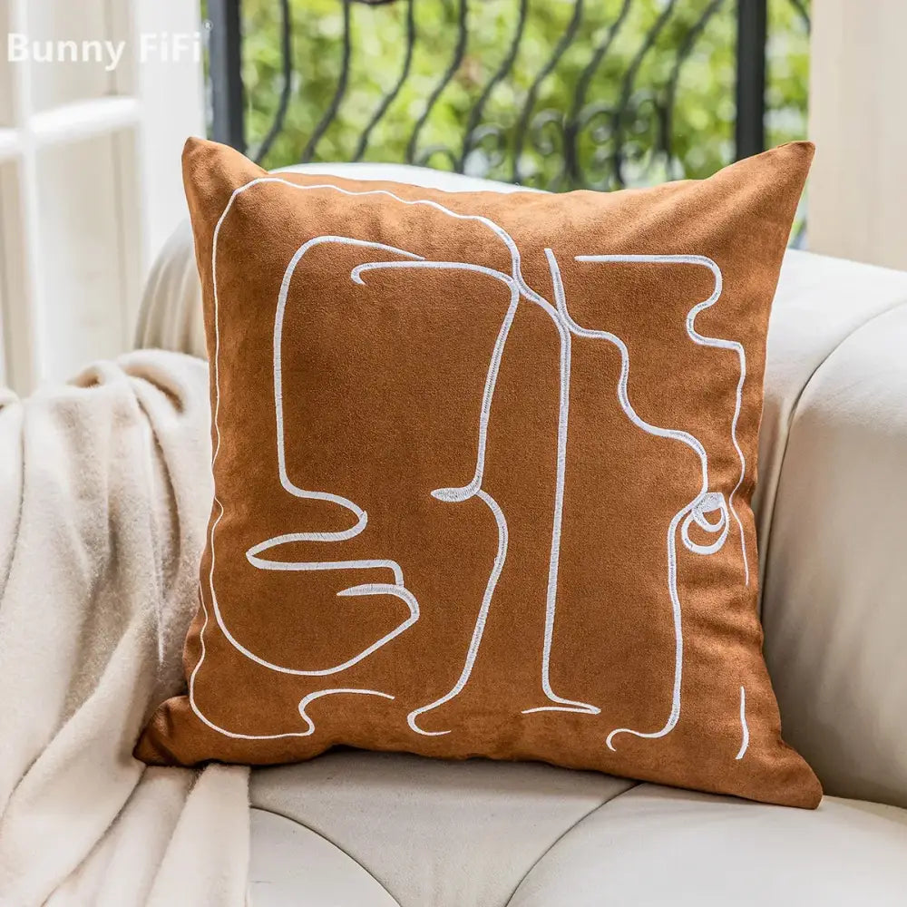 Brown suede plush cushion cover with white geometric embroidery ideal for living room decor