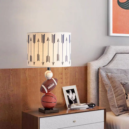 Brown Cartoon Night Table Lamp with Ball Decor - Cylinder Fabric Task Light for Bedroom
