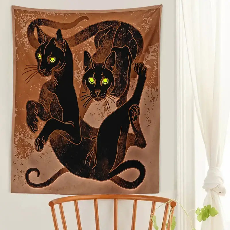 Brown cat witchcraft tapestry featuring two black cats with glowing green eyes in stylized textured design for decorbites cat witchcraft