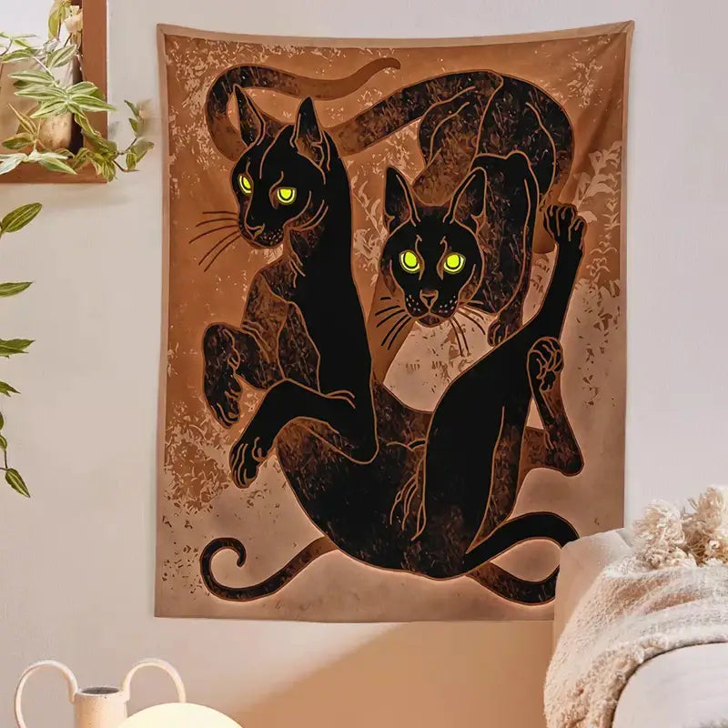 Brown cat witchcraft tapestry featuring two black cats with glowing green eyes in artistic decorbites cat witchcraft style