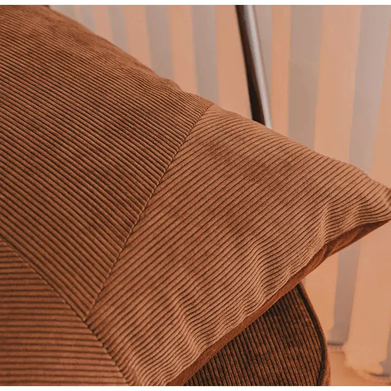 Brown corduroy patchwork cushion cover featuring warm brown fabric with subtle diagonal seam detail for living room decorbites brown corduroy pillow case
