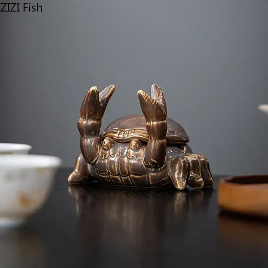 Brown decorbites crab ceramic ashtray and phone holder featuring detailed shell and claws for office decor