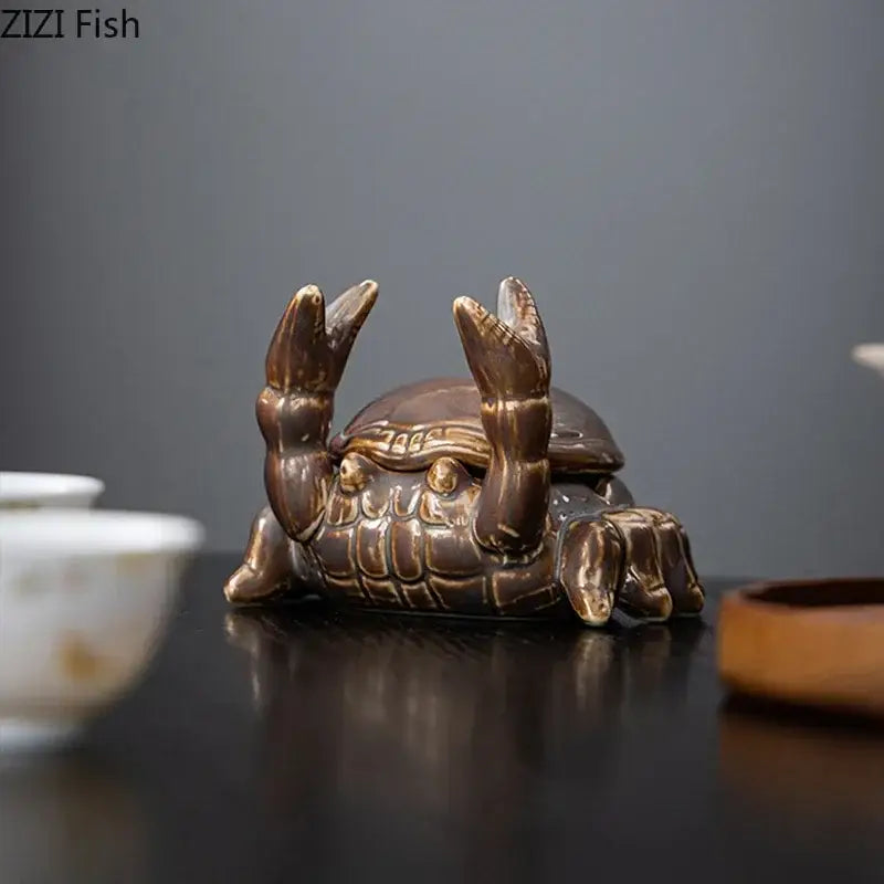 Brown decorbites crab ceramic ashtray and phone holder featuring detailed shell and claws for office decor