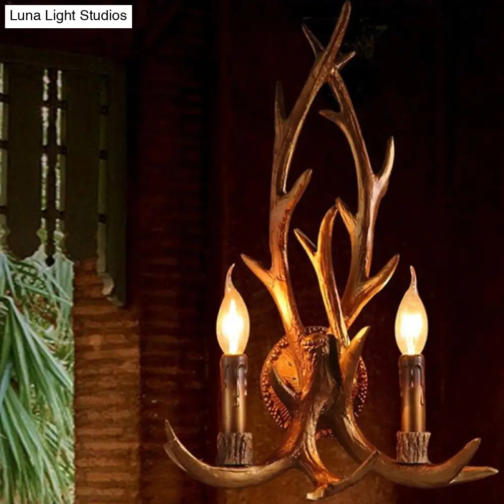 مصباح حائط على شكل قرن غزال بني مع رؤوس راتنجية وديكور شموع - مثالي للمطاعم