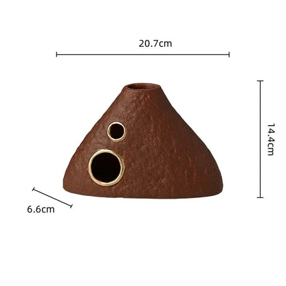 Brown geometric triangle ceramic vase with textured cone shape and gold-edged circular openings for living room decorbites decor