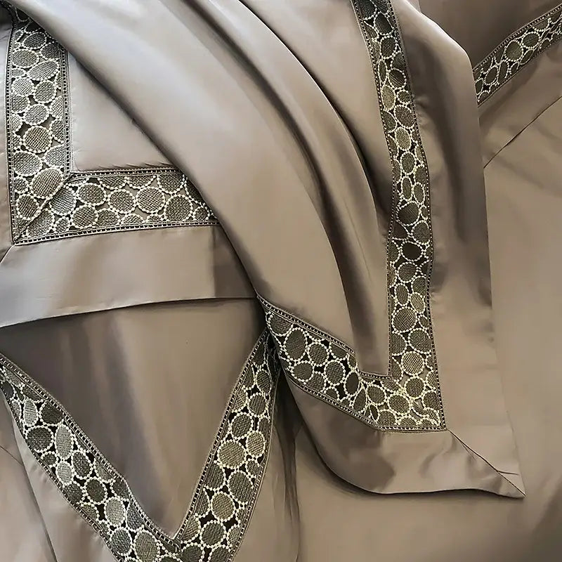 A luxurious taupe satin pillowcase with silver-toned circular embroidery from decorbites brown lace embroidery bedding set