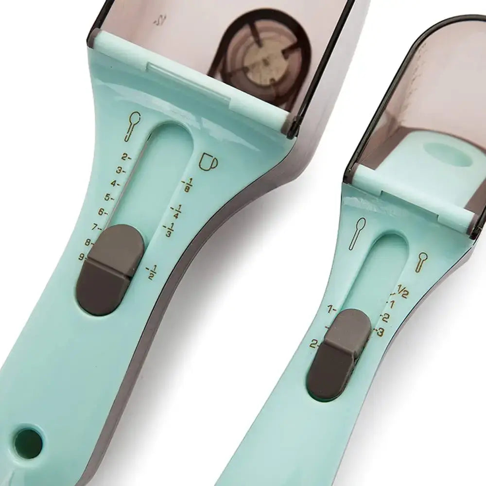 Set of two mint green and dark gray plastic adjustable measuring cups with clear graduated markings for precise measuring