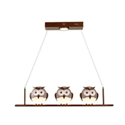 Decorbites owl metal pendant light featuring three brown cartoon owls on a bar with led incandescent fluorescent option