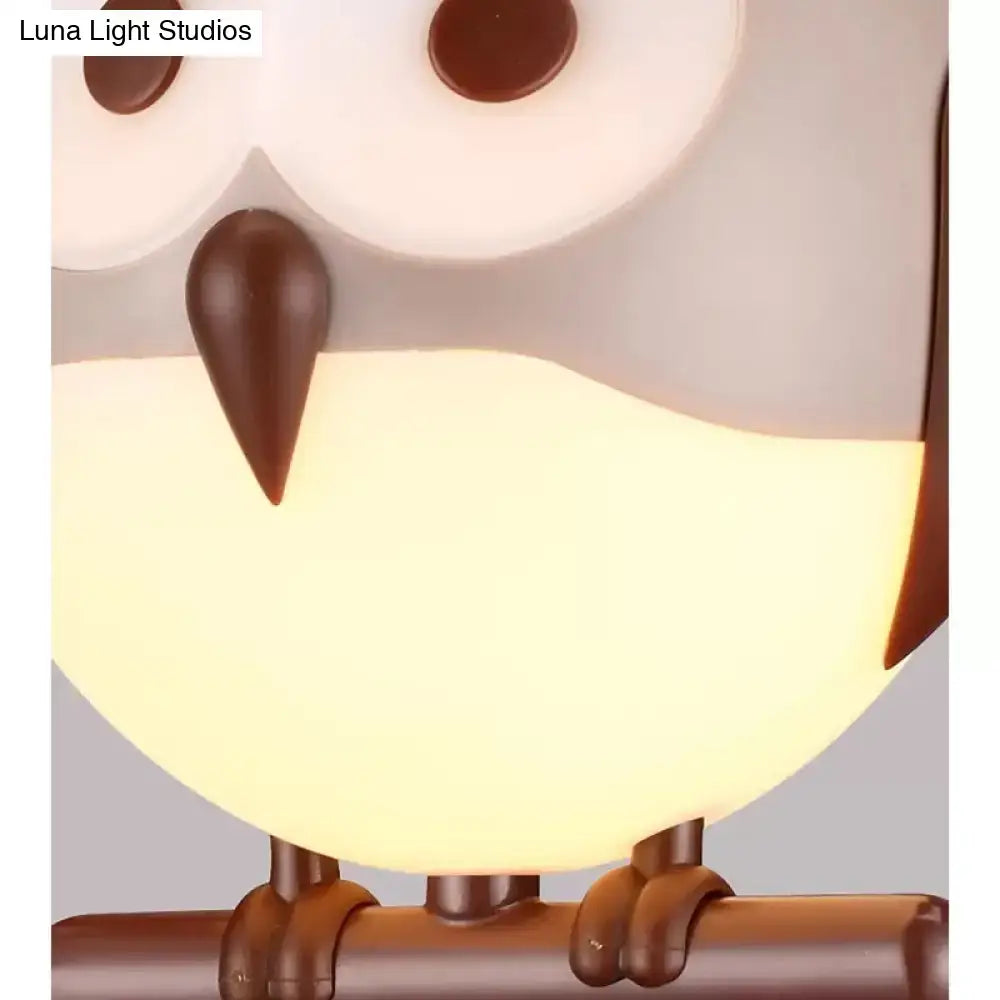 DecorBites owl metal pendant light shaped like a cute brown and white owl with warm led incandescent glowing light