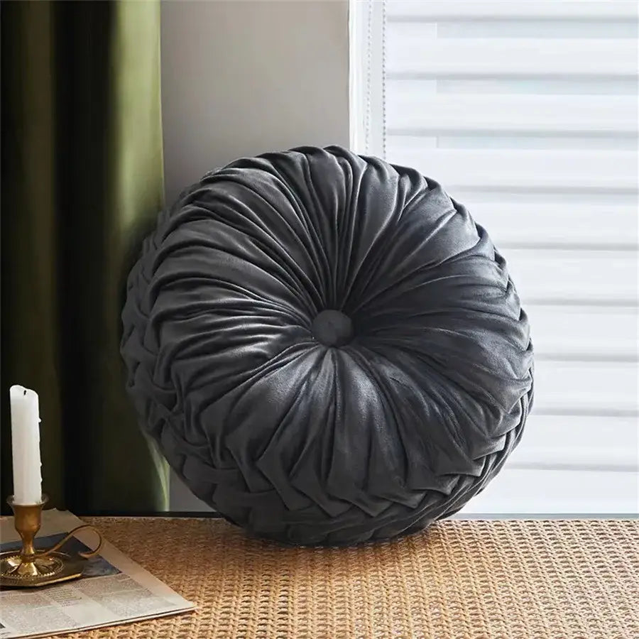 Dark gray velvet round seat cushion with a gathered pleated design ideal for living room use in dutch velvet style