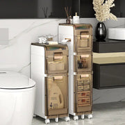 Brown and white multi-layer crevice storage rack bathroom organizer with translucent plastic drawers and gold-tone handles by decorbites crevice storage