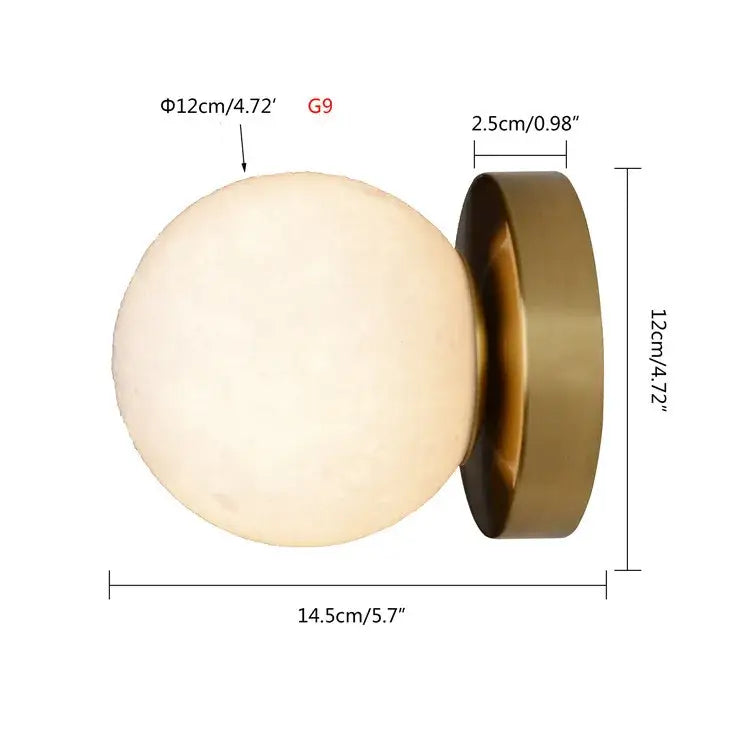 Brushed brass decorbites circular planet wall lamp with an off-white matte globe and brass metallic base for bedroom use
