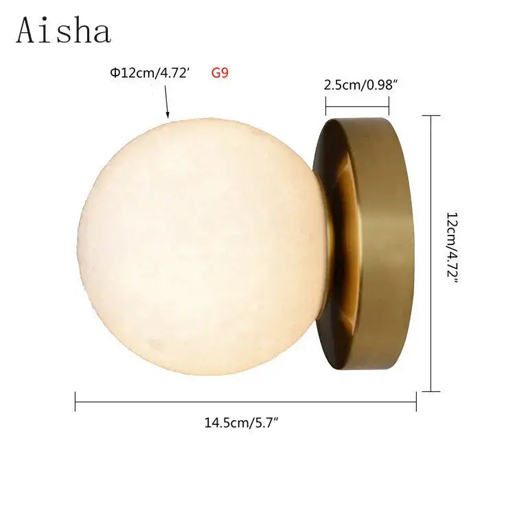 Aisha brand wall lamp with matte off-white spherical glass shade and brushed brass base decorbites circular planet wall