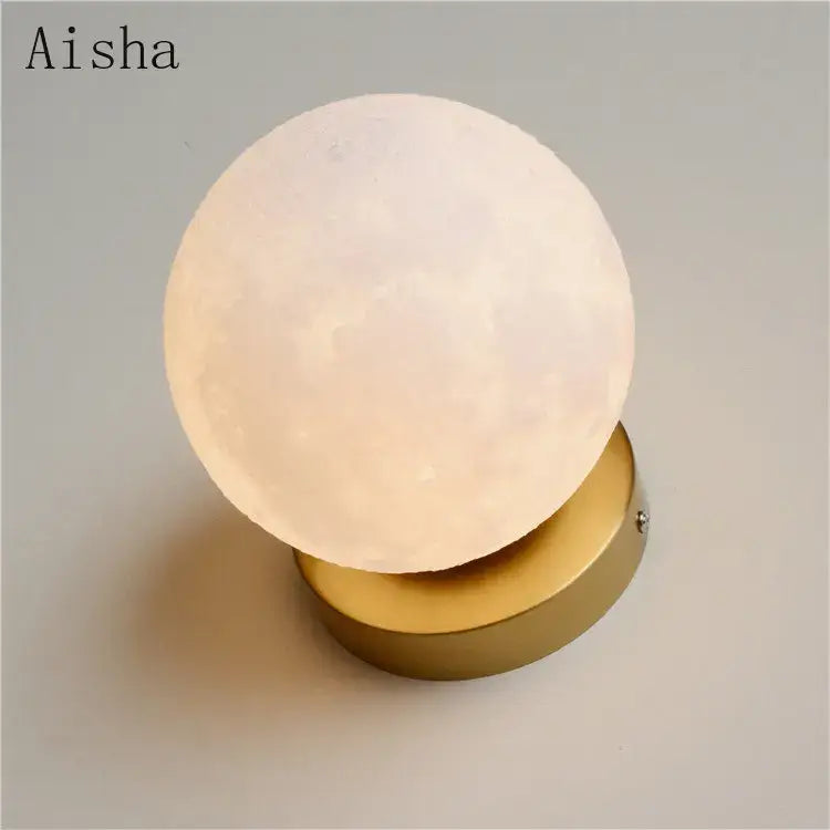 Aisha brand spherical moon lamp with matte white textured surface on polished gold base decorbites circular planet wall lamp