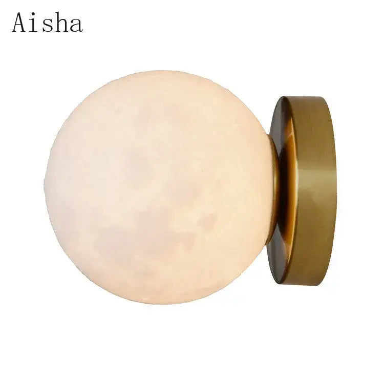 Aisha brand wall lamp with a frosted opal glass globe and brushed brass base in the decorbites circular planet wall style