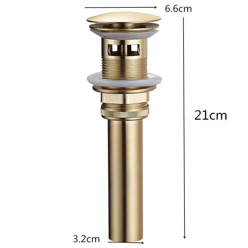 Brushed gold and white ceramic bathroom sink drain assembly kit with gold-colored brass cylindrical drain assembly