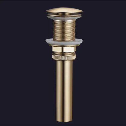 Brushed gold and white ceramic bathroom sink drain assembly kit featuring a gold-toned brass drain assembly with threaded sections