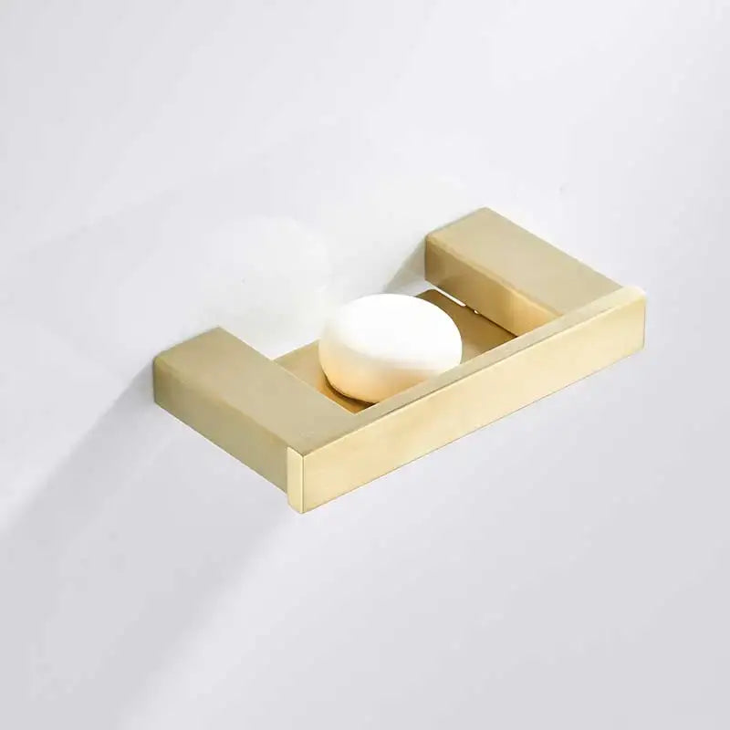 Brushed gold stainless steel rectangular soap dish with sleek modern design holding white bar of soap decorbites brushed gold