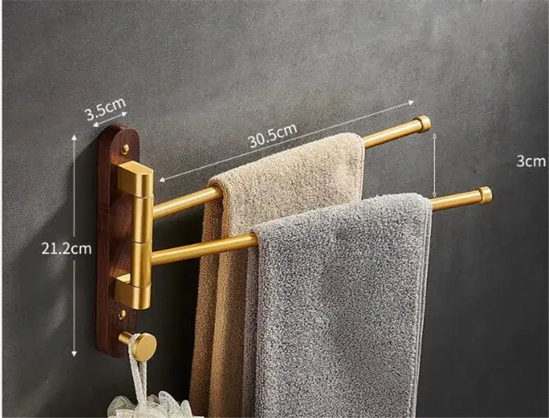 Brushed gold swivel towel hanger with double rack and dark wood mounting plate for bathroom use