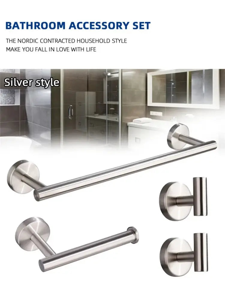Silver stainless steel bathroom hardware set with minimalist design includes towel bar and toilet paper holder