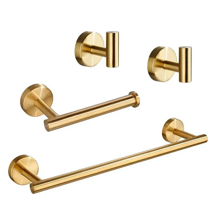 Set of brushed gold bathroom hardware set with towel bar, two wall-mounted hooks, and toilet paper holder