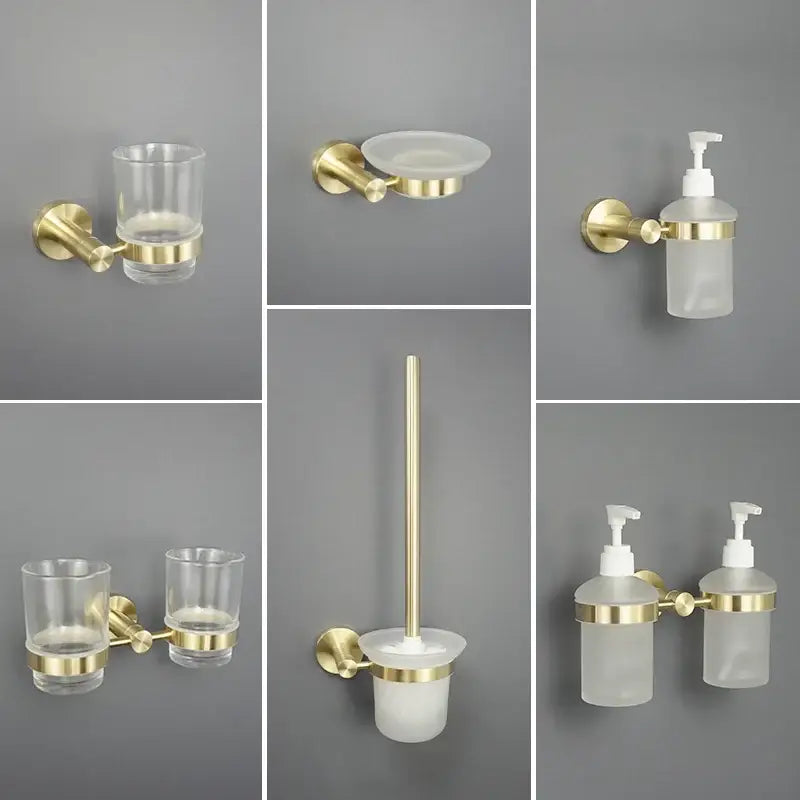 Brushed gold bathroom pendant set featuring wall-mounted towel bar paper holder with frosted glass and clear acrylic components