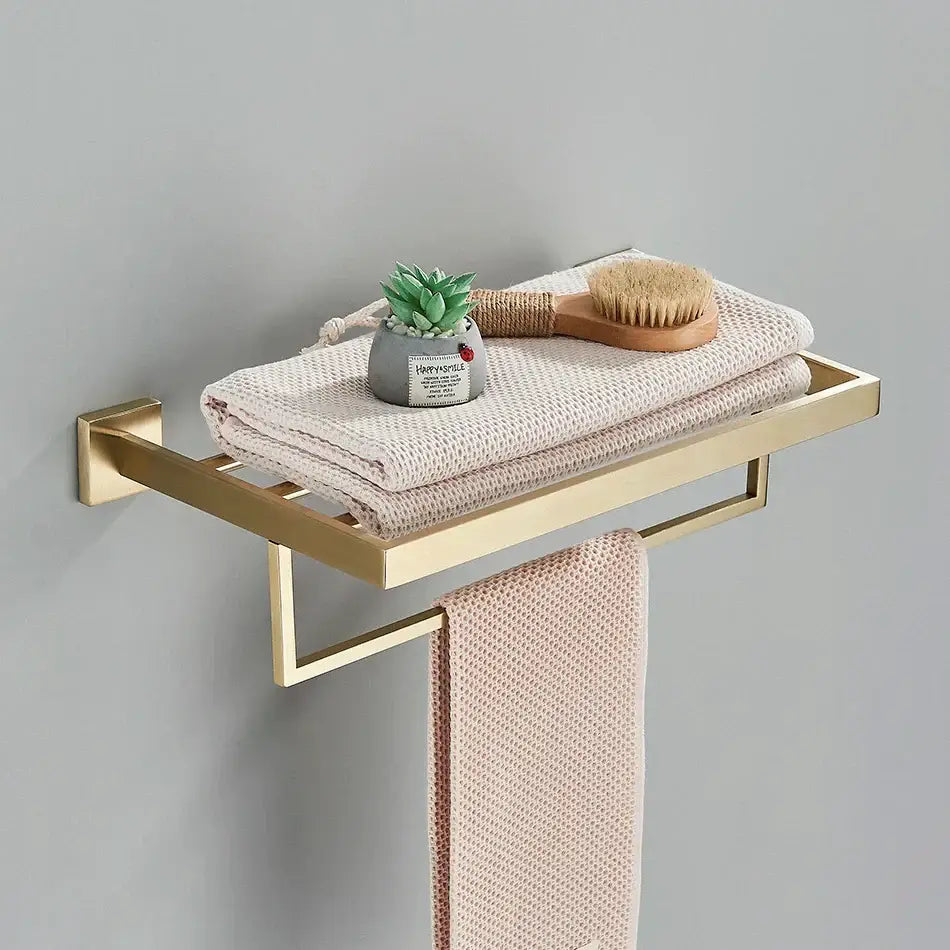 Brushed gold bathroom towel rack with multi bar shelf and hooks in decorbites brushed gold metal finish