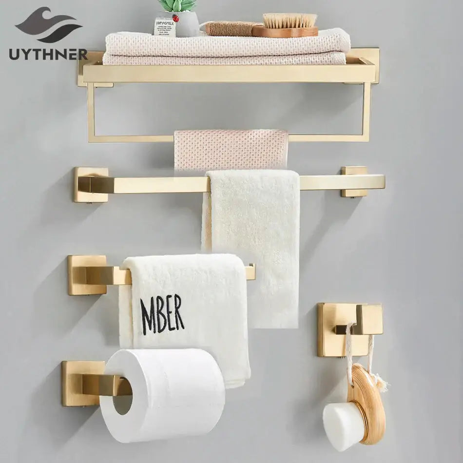 Brushed gold bathroom towel rack set with multi bar shelf and hooks in metal finish for bathroom organization decorbites brushed gold