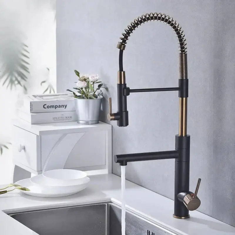 Brushed gold and black kitchen faucet by decorbites with flexible coiled spring pull down spout for modern kitchens