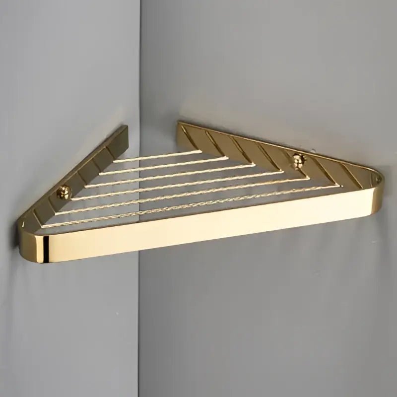 Brushed gold brass bathroom shower rack with triangular design and diagonal slats for corner storage decorbites brass bathroom
