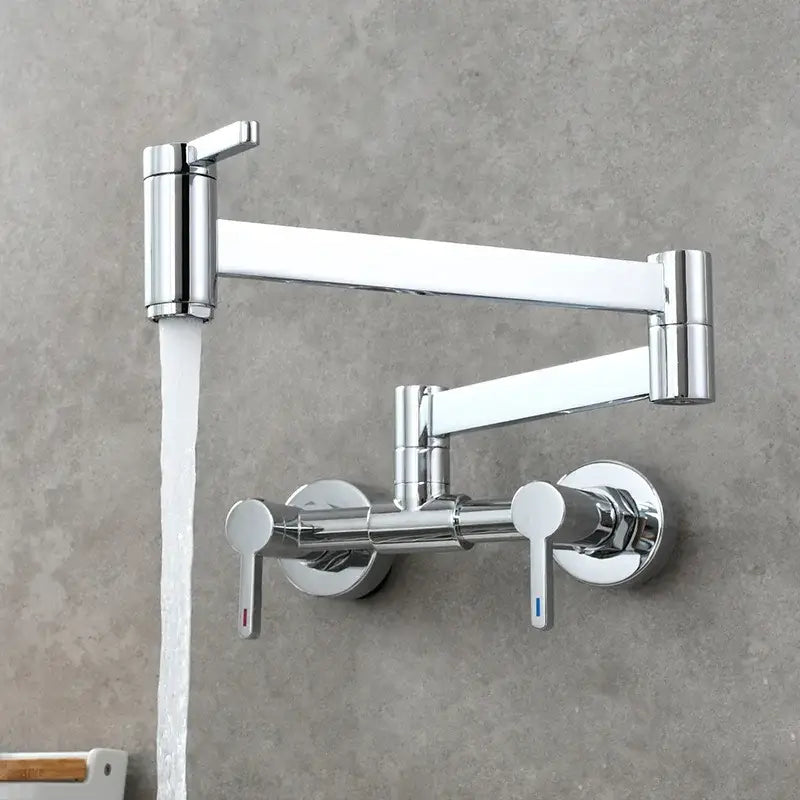 Chrome finished articulated kitchen faucet with dual handles and foldable spout complements brushed gold kitchen faucet designs