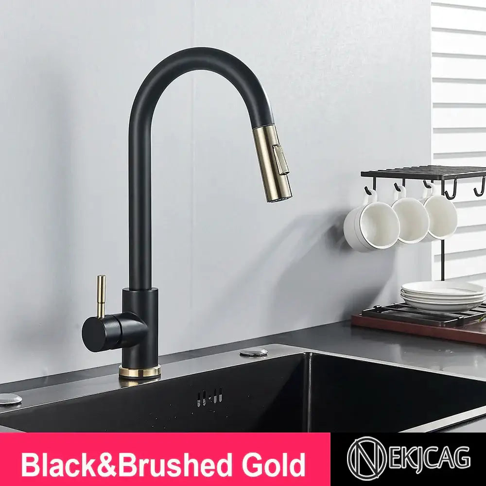 Brushed gold kitchen faucet with a sleek black arched spout and high arc pull-down spray head by decorbites