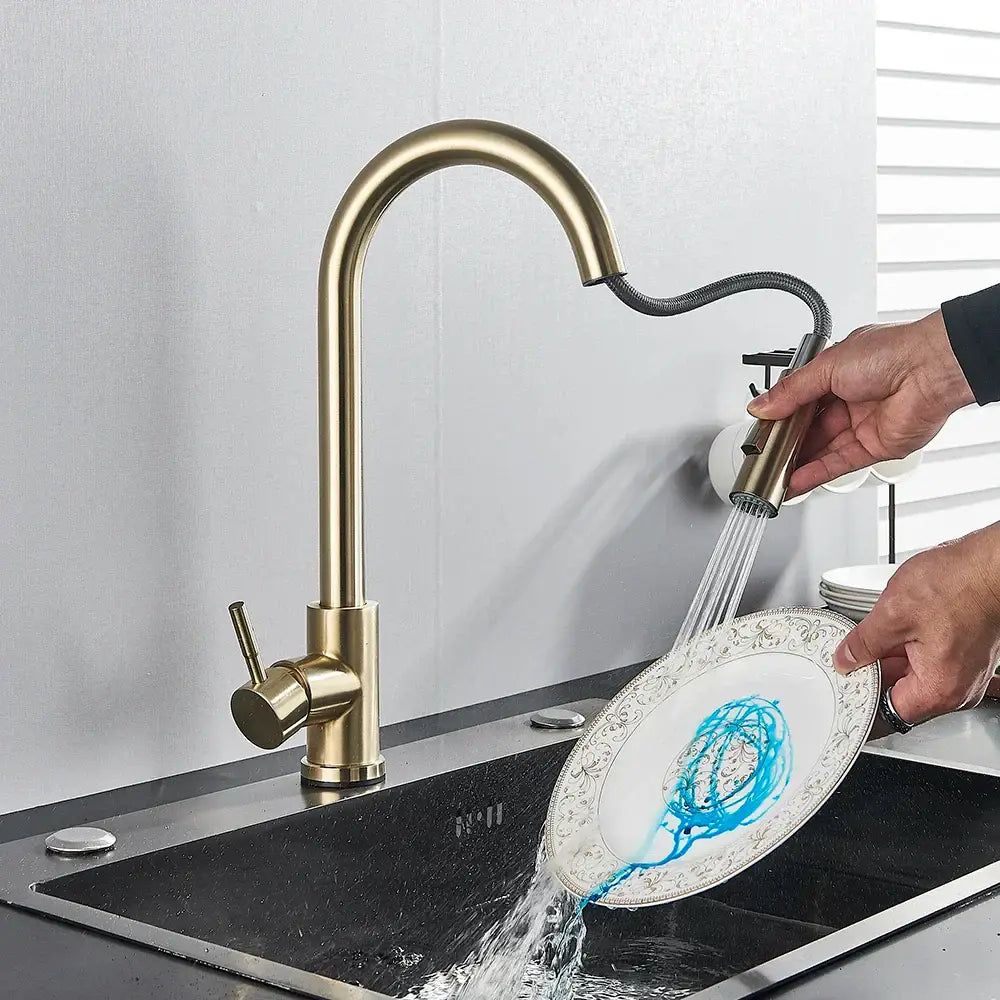 Brushed gold kitchen faucet with high arc pull down spray head and flexible hose by decorbites in brass finish